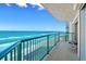 Expansive oceanfront balcony with seating area, offering stunning views of the ocean and coastline at 3311 S Atlantic Ave # 1704, Daytona Beach Shores, FL 32118