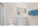Cozy bathroom featuring a white vanity, neutral walls, and glass-enclosed shower for a clean, modern feel at 3311 S Atlantic Ave # 1704, Daytona Beach Shores, FL 32118