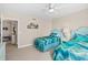 Comfortable bedroom with two beds, featuring beachy decor and ample space for a relaxing stay at 3311 S Atlantic Ave # 1704, Daytona Beach Shores, FL 32118