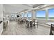 Bright dining area with plenty of table seating and large windows offering serene ocean views at 3311 S Atlantic Ave # 1704, Daytona Beach Shores, FL 32118