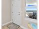 Bright entryway with a view of the balcony, showcasing a welcoming space with a view at 3311 S Atlantic Ave # 1704, Daytona Beach Shores, FL 32118