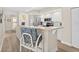 Modern kitchen featuring stainless steel appliances, ample counter space, and a breakfast bar with seating at 3311 S Atlantic Ave # 1704, Daytona Beach Shores, FL 32118