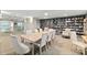 Inviting library with bookshelves, comfortable seating, and ocean views at 3311 S Atlantic Ave # 1704, Daytona Beach Shores, FL 32118