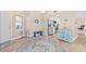 Inviting living area features open space with a peek into the stainless steel kitchen appliances at 3311 S Atlantic Ave # 1704, Daytona Beach Shores, FL 32118