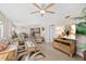 Spacious living room with tropical décor, complemented by an ocean view, and a smooth transition to the dining area at 3311 S Atlantic Ave # 1704, Daytona Beach Shores, FL 32118