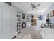 Spacious bedroom showcasing neutral paint, ample natural light, and versatile furniture at 3451 Luna Bella Ln, New Smyrna Beach, FL 32168