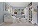 Bright bedroom featuring neutral paint, ample natural light, and versatile furniture at 3451 Luna Bella Ln, New Smyrna Beach, FL 32168