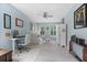 Bright bedroom featuring neutral paint, ample natural light, and versatile furniture at 3451 Luna Bella Ln, New Smyrna Beach, FL 32168