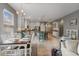 Spacious eat-in kitchen featuring tile floors, neutral paint, and stainless steel appliances at 3451 Luna Bella Ln, New Smyrna Beach, FL 32168