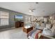 Open concept living room with view to kitchen and dining area at 3451 Luna Bella Ln, New Smyrna Beach, FL 32168
