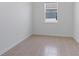 Bright, sunlit room with tile flooring, ready for personalized touches and decor at 34568 Shellback St, Leesburg, FL 34788