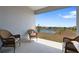 Relaxing outdoor patio overlooking serene pond and neighboring properties at 34568 Shellback St, Leesburg, FL 34788