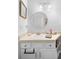 Well-lit bathroom with a mirror, ample counter space, and under-sink storage at 357 Heritage Estates Ln, Deland, FL 32720