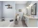 Bathroom with soaking tub, double sink vanity, and tile floor at 357 Heritage Estates Ln, Deland, FL 32720