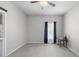 Minimalist bedroom with tile flooring, neutral paint, and natural light at 357 Heritage Estates Ln, Deland, FL 32720