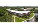 Beautiful two-story condo with brick accents, mature trees, and manicured lawns at 3800 Saxon Dr # 150, New Smyrna Beach, FL 32169