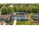 Charming home with new roof, white fence, lush landscaping, and large backyard shed at 430 Spring Dr, Ocala, FL 34472
