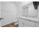This bathroom has a granite vanity, modern sink, and a toilet, and a shower-tub with a shower curtain at 430 Spring Dr, Ocala, FL 34472