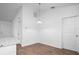 Open dining room with modern pendant lighting and wood-look flooring at 430 Spring Dr, Ocala, FL 34472