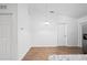Dining room with modern lighting, neutral walls, and an open floor plan at 430 Spring Dr, Ocala, FL 34472
