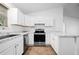 Bright kitchen featuring stainless appliances and quartz countertops at 430 Spring Dr, Ocala, FL 34472