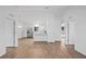 Bright living room showcasing neutral walls and wood-look floors at 430 Spring Dr, Ocala, FL 34472