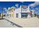Commercial space featuring multiple bays and sidewalks, blending practical design with aesthetic appeal at 484 Landshark Blvd, Daytona Beach, FL 32124