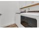 Well-equipped laundry room with modern appliances and ample storage space at 484 Landshark Blvd, Daytona Beach, FL 32124