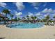 The pool is surrounded by lush landscaping and has plenty of lounge chairs and umbrellas for residents to enjoy at 484 Landshark Blvd, Daytona Beach, FL 32124