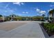 Vibrant town square, perfect for community gatherings, surrounded by lush greenery and ample seating at 484 Landshark Blvd, Daytona Beach, FL 32124