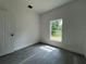 Bedroom with wood floors and lots of natural light at 516 Model St, Daytona Beach, FL 32114