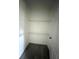 Walk-in closet with wire shelving, offering practical storage solutions for an organized wardrobe at 516 Model St, Daytona Beach, FL 32114