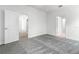 Spacious bedroom with large door openings leading to other spaces in the house at 561 Coronado Cove Road, New Smyrna Beach, FL 32168