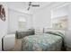 Bright bedroom with two beds, ample natural light, and a calming atmosphere for restful nights at 5610 Nw 37Th Lane Rd, Ocala, FL 34482