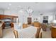 Open-concept kitchen and dining area, ideal for modern living and entertaining with stainless steel appliances at 5610 Nw 37Th Lane Rd, Ocala, FL 34482