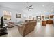 Comfortable living room with an open layout and views of the kitchen at 5610 Nw 37Th Lane Rd, Ocala, FL 34482