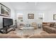 Inviting living room with plush seating and neutral decor, perfect for relaxation and entertaining guests at 5610 Nw 37Th Lane Rd, Ocala, FL 34482