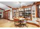 Cozy breakfast nook features wood trim, natural light, and views of the outdoors at 585 Summerhaven Dr, Debary, FL 32713