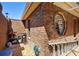 Exterior showcasing brickwork, unique window, and landscaped area at 585 Summerhaven Dr, Debary, FL 32713