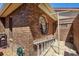 Exterior showcasing brickwork, unique window, and landscaped area at 585 Summerhaven Dr, Debary, FL 32713