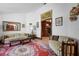 Comfortable living room with a striped sofa and classic decor at 585 Summerhaven Dr, Debary, FL 32713