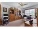 Functional home office featuring built-in shelving and a comfortable workspace at 585 Summerhaven Dr, Debary, FL 32713