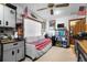 Well-organized workshop with diamond plate cabinets, work bench, and storage; perfect space for DIY projects and hobbies at 585 Summerhaven Dr, Debary, FL 32713