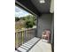 Enjoy outdoor living on this private balcony with views of lush landscaping and community pool at 600 N Boundary Ave # 114-C, Deland, FL 32720