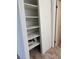 Linen closet with shelving and bi-fold doors at 600 N Boundary Ave # 114-C, Deland, FL 32720