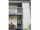 Charming condo entrance features a decorated entryway, neutral paint, and easy access at 600 N Boundary Ave # 114-C, Deland, FL 32720