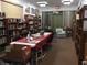 This library features plenty of bookshelves, a large table, and a comfortable armchair at 600 N Boundary Ave # 114-C, Deland, FL 32720