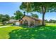 Charming brick home features a well-manicured lawn and an attached two-car garage at 61 Bryan Cave Rd, South Daytona, FL 32119
