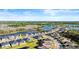 An aerial view of the home in a beautiful community with mature trees and landscaping at 617 Mosaic Blvd, Daytona Beach, FL 32124