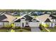 Aerial view of a home in a neighborhood with lush greenery and well-maintained lawns at 617 Mosaic Blvd, Daytona Beach, FL 32124